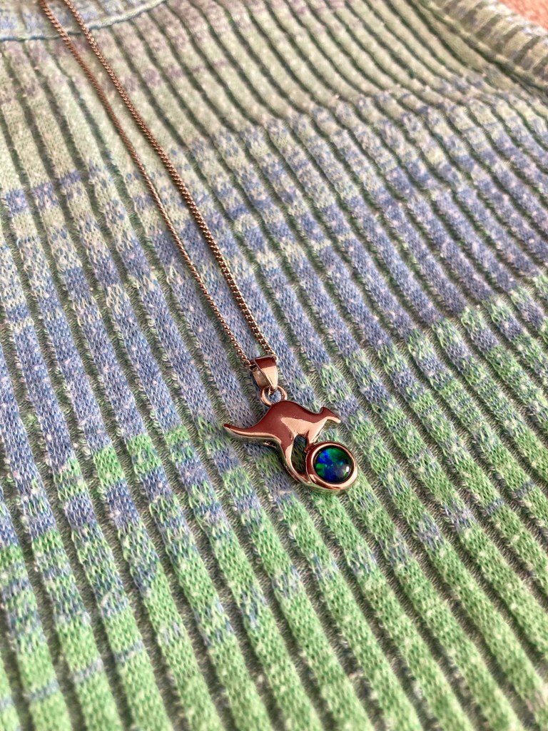 Silver necklace with small opal stone